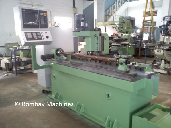 CNC GROOVE MILLING MACHINE FOR ROLLERS